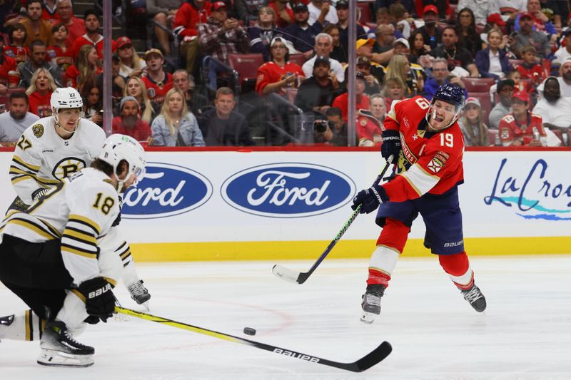 May 6, 2024; Sunrise, Florida, USA; Florida Panthers left wing Matthew Tkachuk (19) shoots the puck against the Boston Bruins during the second period in game one of the second round of the 2024 Stanley Cup Playoffs at Amerant Bank Arena. Mandatory Credit: Sam Navarro-USA TODAY Sports