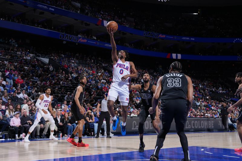 PHILADELPHIA, PA - APRIL 14: Tyrese Maxey #0 of the Philadelphia 76ers shoots the ball during the game against the Brooklyn Nets on April 14, 2024 at the Wells Fargo Center in Philadelphia, Pennsylvania NOTE TO USER: User expressly acknowledges and agrees that, by downloading and/or using this Photograph, user is consenting to the terms and conditions of the Getty Images License Agreement. Mandatory Copyright Notice: Copyright 2024 NBAE (Photo by Jesse D. Garrabrant/NBAE via Getty Images)