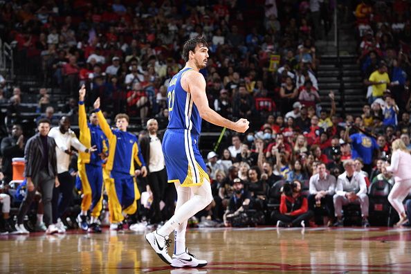 HOUSTON, TX - OCTOBER 29: Dario Saric #20 of the Golden State Warriors celebrates during the game against the Houston Rockets on October 29, 2023 at the Toyota Center in Houston, Texas. NOTE TO USER: User expressly acknowledges and agrees that, by downloading and or using this photograph, User is consenting to the terms and conditions of the Getty Images License Agreement. Mandatory Copyright Notice: Copyright 2023 NBAE (Photo by Logan Riely/NBAE via Getty Images)