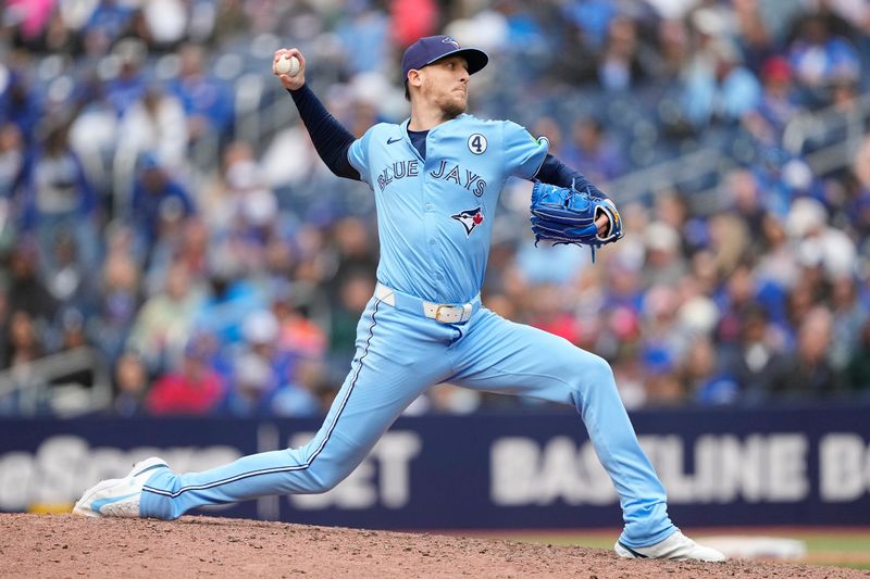 Jun 1, 2025; Toronto, Ontario, CAN; Toronto Blue Jays pitcher Jeff Hoffman (23) pitches to the Oakland Athletics during the ninth inning at Rogers Centre. Mandatory Credit: John E. Sokolowski-Imagn Images