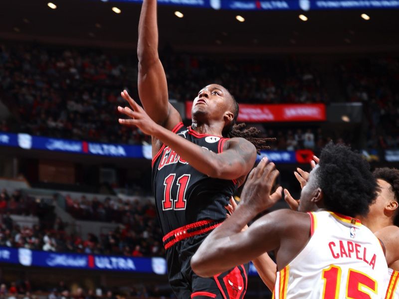 CHICAGO, IL - NOVEMBER 22: Ayo Dosunmu #11 of the Chicago Bulls drives to the basket during the game against the Atlanta Hawks during the Emirates NBA Cup game on November 22, 2024 at United Center in Chicago, Illinois. NOTE TO USER: User expressly acknowledges and agrees that, by downloading and or using this photograph, User is consenting to the terms and conditions of the Getty Images License Agreement. Mandatory Copyright Notice: Copyright 2024 NBAE (Photo by Jeff Haynes/NBAE via Getty Images)