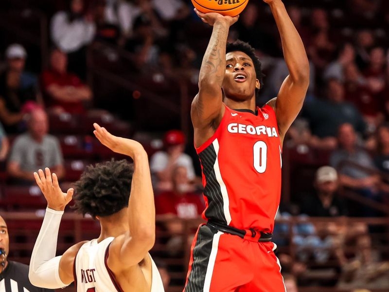 Mar 4, 2023; Columbia, South Carolina, USA; Georgia Bulldogs guard Terry Roberts (0) shoots against the South Carolina Gamecocks  in the second half at Colonial Life Arena. Mandatory Credit: Jeff Blake-USA TODAY Sports