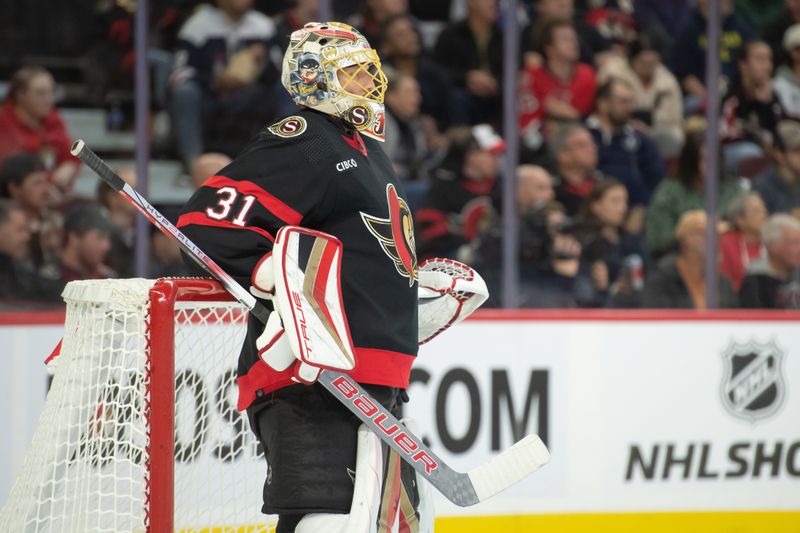 Oct 18, 2023; Ottawa, Ontario, CAN; Ottawa Senators goalie Anton Forsberg (31) follows the action up the ice in the second period against the Washington Capitals  at the Canadian Tire Centre. Mandatory Credit: Marc DesRosiers-USA TODAY Sports