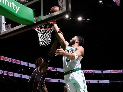 BOSTON, MA - DECEMBER 28: Jayson Tatum #0 of the Boston Celtics drives to the basket during the game against the Detroit Pistons on December 28, 2023 at the TD Garden in Boston, Massachusetts. NOTE TO USER: User expressly acknowledges and agrees that, by downloading and or using this photograph, User is consenting to the terms and conditions of the Getty Images License Agreement. Mandatory Copyright Notice: Copyright 2023 NBAE  (Photo by Brian Babineau/NBAE via Getty Images)