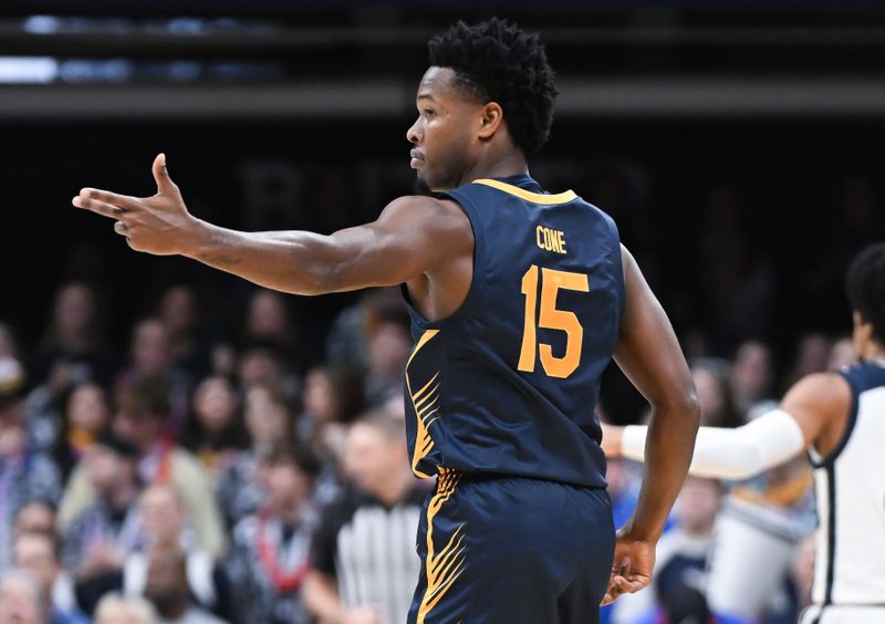 Dec 9, 2023; Indianapolis, Indiana, USA;  California Golden Bears guard Jalen Cone (15) celebrates after making a shot against the Butler Bulldogs during the first half at Hinkle Fieldhouse. Mandatory Credit: Robert Goddin-USA TODAY Sports