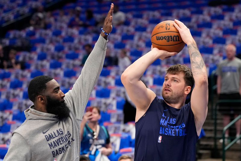 DALLAS, TEXAS - APRIL 07: Luka Doncic #77 of the Dallas Mavericks warms up before the game against the Houston Rockets at American Airlines Center on April 07, 2024 in Dallas, Texas. NOTE TO USER: User expressly acknowledges and agrees that, by downloading and or using this photograph, User is consenting to the terms and conditions of the Getty Images License Agreement. (Photo by Sam Hodde/Getty Images)