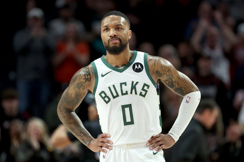 PORTLAND, OREGON - JANUARY 31: Damian Lillard #0 of the Milwaukee Bucks reacts during the second quarter against the Portland Trail Blazers at Moda Center on January 31, 2024 in Portland, Oregon. (Photo by Steph Chambers/Getty Images)