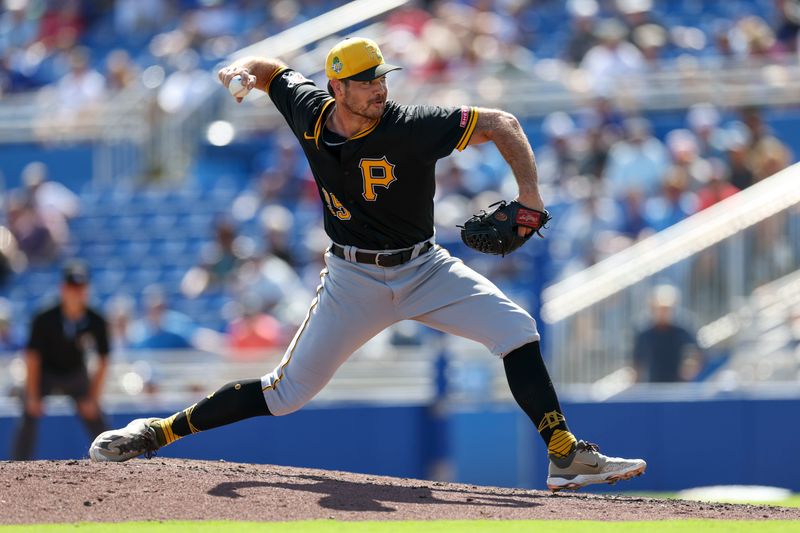 Mar 6, 2026; Dunedin, Florida, USA; Pittsburgh Pirates first baseman Nick Cimillo (94) throws a pitch against the Toronto Blue Jays in the fourth inning during spring training at TD Ballpark. Mandatory Credit: Nathan Ray Seebeck-Imagn Images
