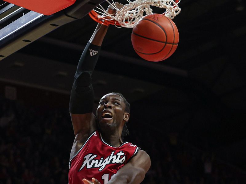 Feb 29, 2024; Piscataway, New Jersey, USA; Rutgers Scarlet Knights center Clifford Omoruyi (11) dunks the ball during the second half against the Michigan Wolverines at Jersey Mike's Arena. Mandatory Credit: Vincent Carchietta-USA TODAY Sports