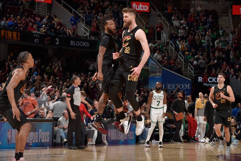 CLEVELAND, OH - MARCH 5: Dean Wade #32 of the Cleveland Cavaliers celebrates during the game against the Boston Celtics on March 5, 2024 at Rocket Mortgage FieldHouse in Cleveland, Ohio. NOTE TO USER: User expressly acknowledges and agrees that, by downloading and/or using this Photograph, user is consenting to the terms and conditions of the Getty Images License Agreement. Mandatory Copyright Notice: Copyright 2024 NBAE (Photo by David Liam Kyle/NBAE via Getty Images)