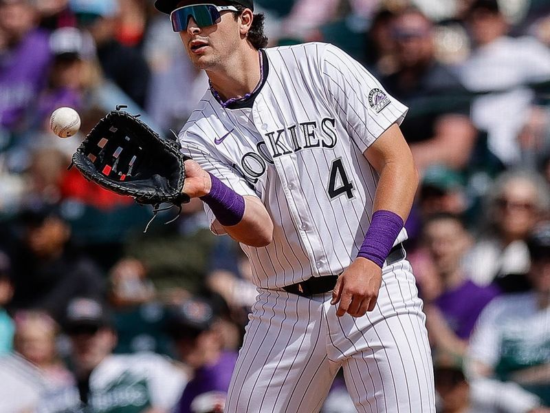 Apr 20, 2025; Denver, Colorado, USA; Colorado Rockies first baseman Michael Toglia (4) in the sixth inning against the Washington Nationals at Coors Field. Mandatory Credit: Isaiah J. Downing-Imagn Images