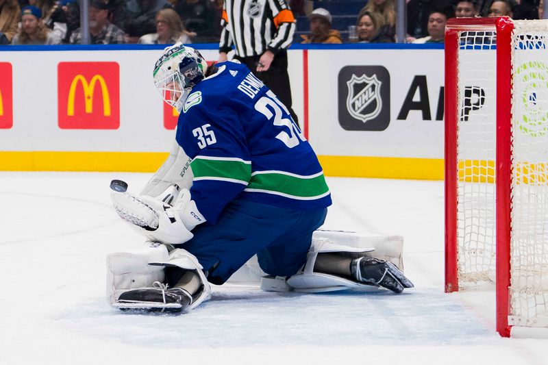 Feb 17, 2024; Vancouver, British Columbia, CAN; Vancouver Canucks goalie Thatcher Demko (35) makes a save against the Winnipeg Jets in the first period at Rogers Arena. Mandatory Credit: Bob Frid-USA TODAY Sports