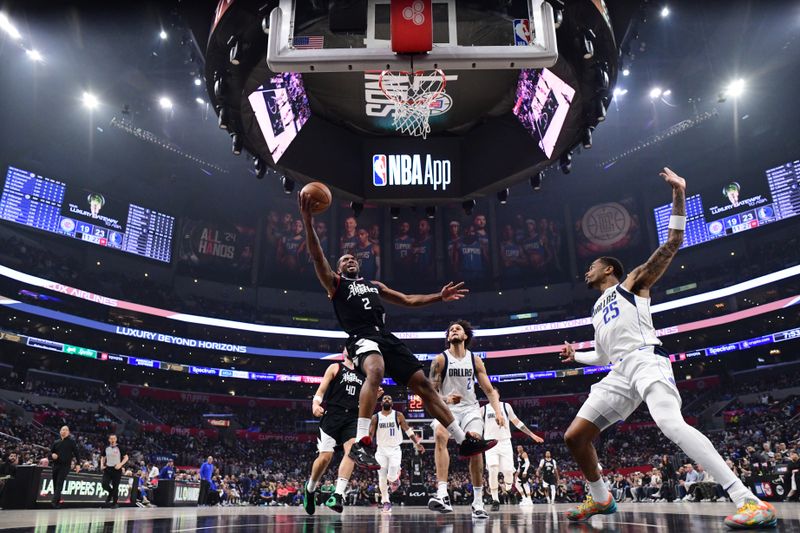 LOS ANGELES, CA - APRIL 23: Kawhi Leonard #2 of the LA Clippers goes to the basket during the game  against the Dallas Mavericks during Round 1 Game 2 of the 2024 NBA Playoffs on April 23, 2024 at Crypto.Com Arena in Los Angeles, California. NOTE TO USER: User expressly acknowledges and agrees that, by downloading and/or using this Photograph, user is consenting to the terms and conditions of the Getty Images License Agreement. Mandatory Copyright Notice: Copyright 2024 NBAE (Photo by Adam Pantozzi/NBAE via Getty Images)