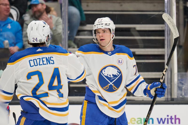 Jan 27, 2024; San Jose, California, USA; Buffalo Sabres right wing JJ Peterka (77) celebrates with center Dylan Cozens (24) after scoring a goal against the San Jose Sharks during the third period at SAP Center at San Jose. Mandatory Credit: Robert Edwards-USA TODAY Sports