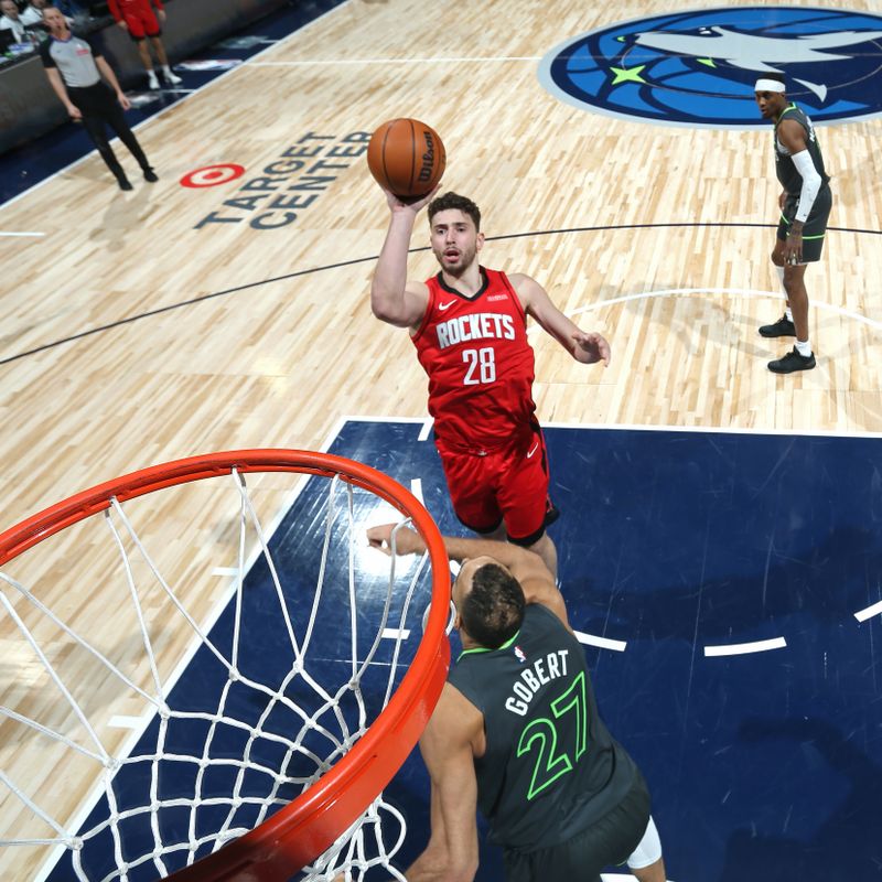 MINNEAPOLIS, MN - FEBRUARY 6: Alperen Sengun #28 of the Houston Rockets shoots the ball during the game against the Minnesota Timberwolves on February 6, 2025 at Target Center in Minneapolis, Minnesota. NOTE TO USER: User expressly acknowledges and agrees that, by downloading and or using this Photograph, user is consenting to the terms and conditions of the Getty Images License Agreement. Mandatory Copyright Notice: Copyright 2025 NBAE(Photo by David Sherman/NBAE via Getty Images)