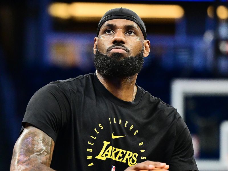 ORLANDO, FLORIDA - MARCH 24: LeBron James #23 of the Los Angeles Lakers warms up prior to a game against the Orlando Magic at Kia Center on March 24, 2025 in Orlando, Florida. NOTE TO USER: User expressly acknowledges and agrees that, by downloading and or using this photograph, User is consenting to the terms and conditions of the Getty Images License Agreement. (Photo by Julio Aguilar/Getty Images)