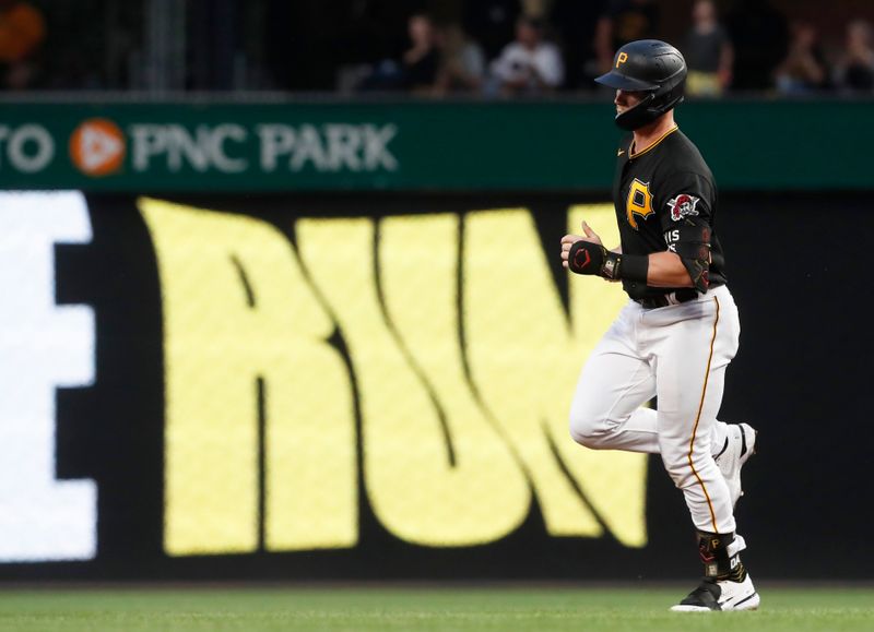 Jul 15, 2023; Pittsburgh, Pennsylvania, USA;  Pittsburgh Pirates right fielder Henry Davis (32) circles the bases on a solo home run against the San Francisco Giants during the second inning at PNC Park. Mandatory Credit: Charles LeClaire-USA TODAY Sports