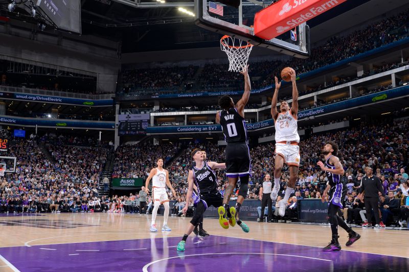 SACRAMENTO, CA - FEBRUARY 22: Devin Vassell #24 of the San Antonio Spurs drives to the basket during the game against the Sacramento Kings on February 22, 2024 at Golden 1 Center in Sacramento, California. NOTE TO USER: User expressly acknowledges and agrees that, by downloading and or using this Photograph, user is consenting to the terms and conditions of the Getty Images License Agreement. Mandatory Copyright Notice: Copyright 2023 NBAE (Photo by Rocky Widner/NBAE via Getty Images)