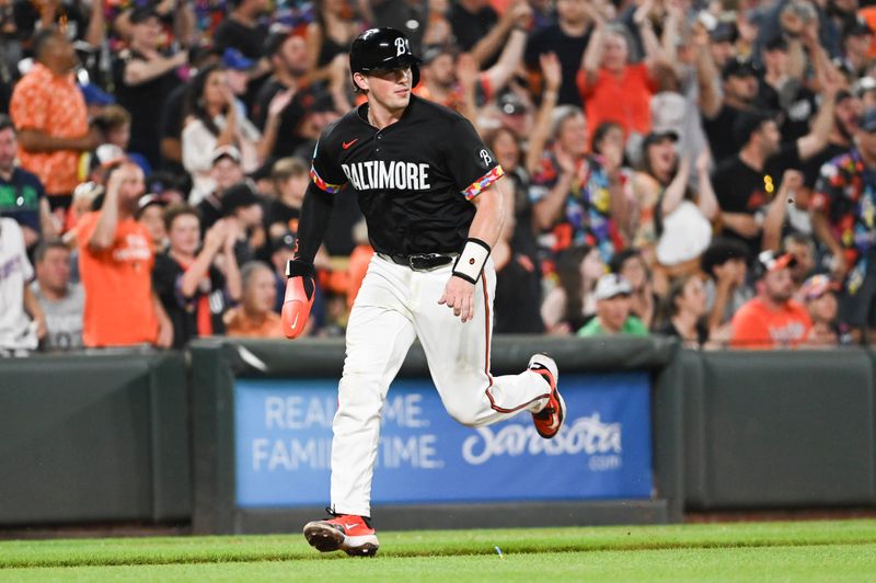 Jun 29, 2024; Baltimore, Maryland, USA;  Baltimore Orioles catcher Adley Rutschman (35) scores in the eighth inning against the Texas Rangersat Oriole Park at Camden Yards. Mandatory Credit: Tommy Gilligan-USA TODAY Sports