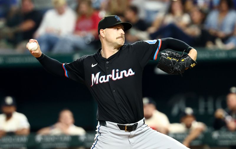 Sep 19, 2025; Arlington, Texas, USA;  Miami Marlins starting pitcher Janson Junk (26) throws during the first inning against the Texas Rangers at Globe Life Field. Mandatory Credit: Kevin Jairaj-Imagn Images