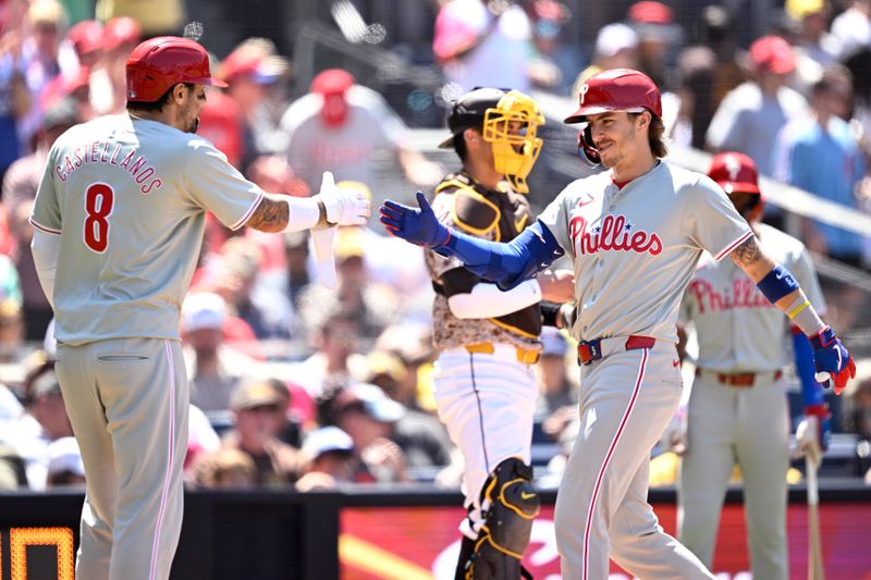 Apr 28, 2024; San Diego, California, USA; Philadelphia Phillies second baseman Bryson Stott (right) celebrates with right fielder Nick Castellanos (8) after hitting a two-run home run against the San Diego Padres during the fourth inning at Petco Park. Mandatory Credit: Orlando Ramirez-USA TODAY Sports