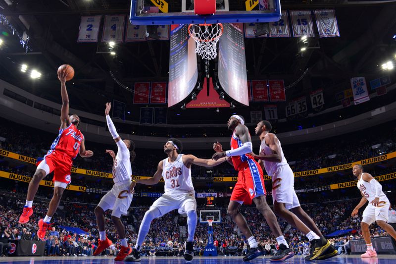 PHILADELPHIA, PA - FEBRUARY 23: Tyrese Maxey #0 of the Philadelphia 76ers drives to the basket during the game against the Cleveland Cavaliers on February 23, 2024 at the Wells Fargo Center in Philadelphia, Pennsylvania NOTE TO USER: User expressly acknowledges and agrees that, by downloading and/or using this Photograph, user is consenting to the terms and conditions of the Getty Images License Agreement. Mandatory Copyright Notice: Copyright 2024 NBAE (Photo by Jesse D. Garrabrant/NBAE via Getty Images)