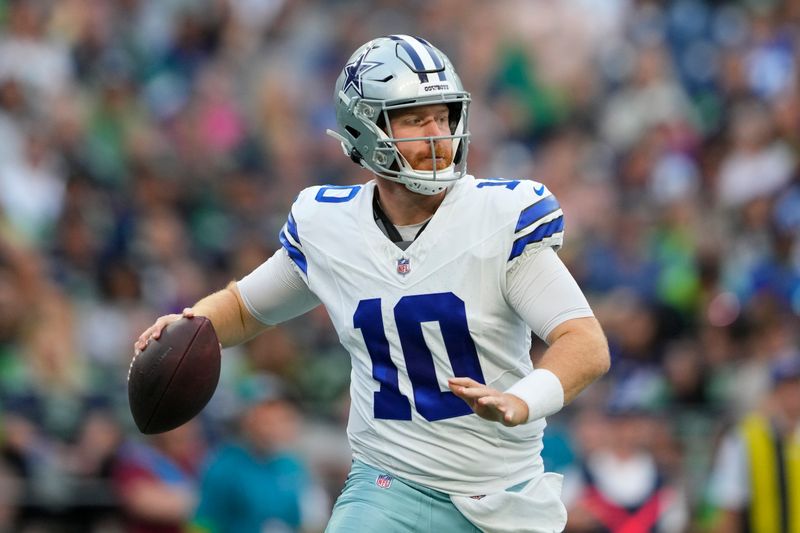 Dallas Cowboys quarterback Cooper Rush looks to throw during a preseason NFL football game against the Seattle Seahawks, Saturday, Aug. 19, 2023, in Seattle. (AP Photo/Lindsey Wasson)