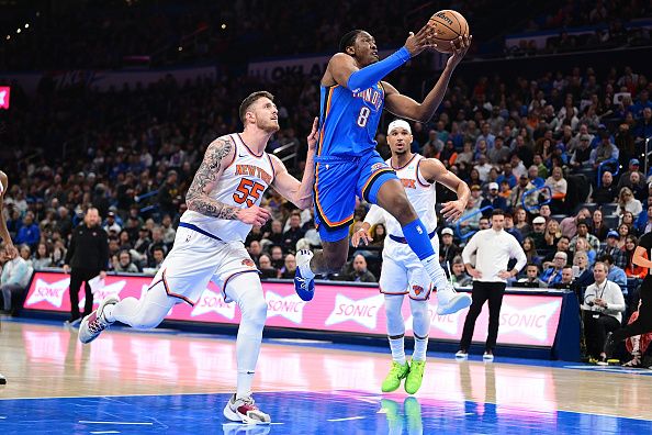 OKLAHOMA CITY, OKLAHOMA - DECEMBER 27: Jalen Williams #8 of the Oklahoma City Thunder drives the lane during the first half against the New York Knicks at Paycom Center on December 27, 2023 in Oklahoma City, Oklahoma. NOTE TO USER: User expressly acknowledges and agrees that, by downloading and or using this Photograph, user is consenting to the terms and conditions of the Getty Images License Agreement. (Photo by Joshua Gateley/Getty Images)