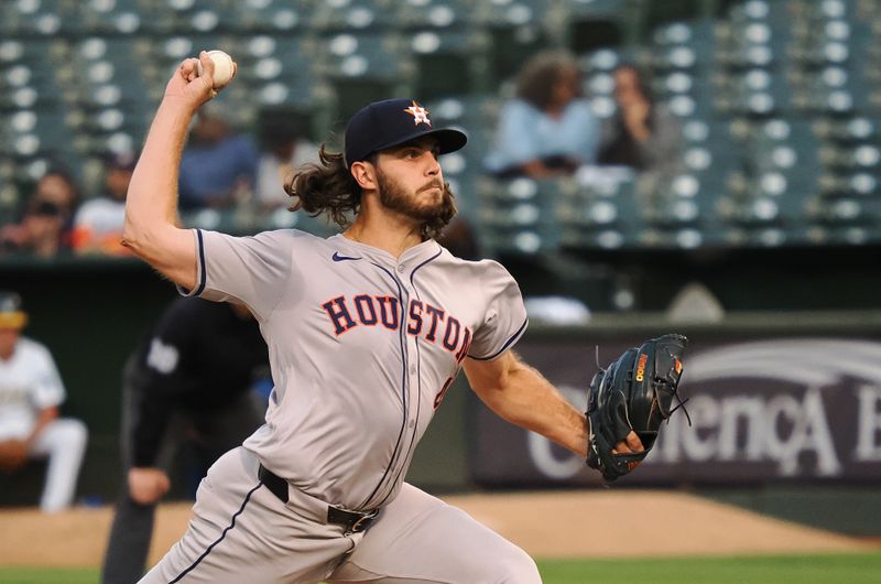 Jul 22, 2024; Oakland, California, USA; Houston Astros starting pitcher Spencer Arrighetti (41) pitches the ball against the Oakland Athletics during the fourth inning at Oakland-Alameda County Coliseum. Mandatory Credit: Kelley L Cox-USA TODAY Sports