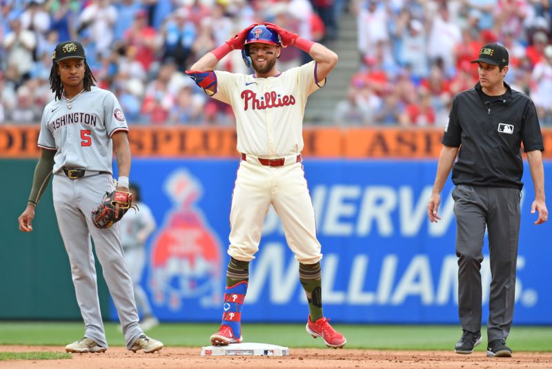 May 19, 2024; Philadelphia, Pennsylvania, USA; Philadelphia Phillies first base Kody Clemens (2) reacts after hitting a two RBI double against the Washington Nationals during the fifth inning at Citizens Bank Park. Mandatory Credit: Eric Hartline-USA TODAY Sports