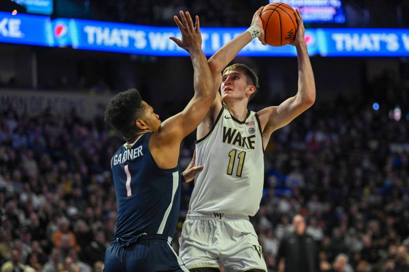 Jan 21, 2023; Winston-Salem, North Carolina, USA; Wake Forest Demon Deacons forward Andrew Carr (11) shoots over Virginia Cavaliers forward Jayden Gardner (1) during the first half at Lawrence Joel Veterans Memorial Coliseum. Mandatory Credit: William Howard-USA TODAY Sports