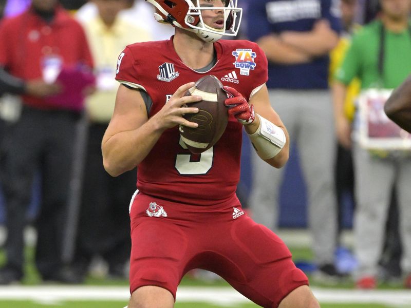 Dec 17, 2022; Inglewood, CA, USA;   Fresno State Bulldogs quarterback Jake Haener (9) drops back to throw a pass against the Washington State Cougars in the second half at SoFi Stadium. Mandatory Credit: Jayne Kamin-Oncea-USA TODAY Sports