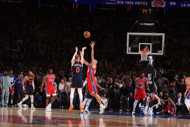 NEW YORK, NY - APRIL 22:  Donte Divincenzo #0 of the New York Knicks shoots the game winning  3-point basket during the game against the Philadelphia 76ers during Round 1 Game 2 of the 2024 NBA Playoffs on April 22, 2024 at Madison Square Garden in New York City, New York.  NOTE TO USER: User expressly acknowledges and agrees that, by downloading and or using this photograph, User is consenting to the terms and conditions of the Getty Images License Agreement. Mandatory Copyright Notice: Copyright 2024 NBAE  (Photo by Nathaniel S. Butler/NBAE via Getty Images)