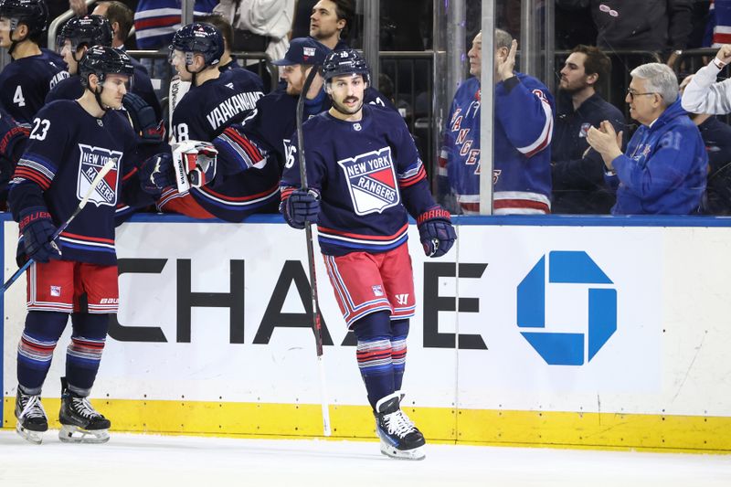 Jan 26, 2025; New York, New York, USA;  New York Rangers center Vincent Trocheck (16) circles back to center ice after scoring a goal in the first period against the Colorado Avalanche at Madison Square Garden. Mandatory Credit: Wendell Cruz-Imagn Images
