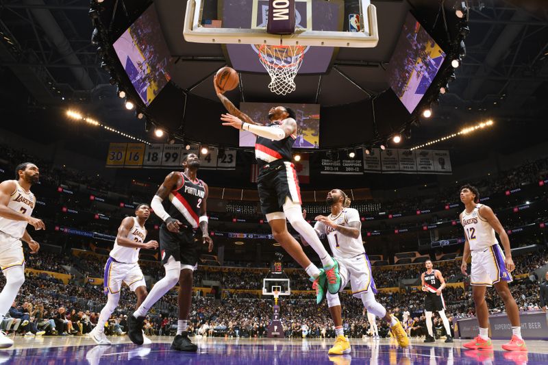 LOS ANGELES, CA - DECEMBER 8: Anfernee Simons #1 of the Portland Trail Blazers drives to the basket during the game against the Los Angeles Lakers on December 8, 2024 at Crypto.Com Arena in Los Angeles, California. NOTE TO USER: User expressly acknowledges and agrees that, by downloading and/or using this Photograph, user is consenting to the terms and conditions of the Getty Images License Agreement. Mandatory Copyright Notice: Copyright 2024 NBAE (Photo by Adam Pantozzi/NBAE via Getty Images)