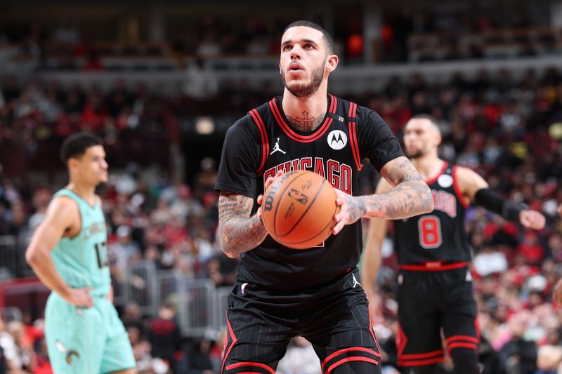 CHICAGO, IL - DECEMBER 13: Lonzo Ball #2 of the Chicago Bulls shoots a free throw during the game against the Charlotte Hornets on December 13, 2024 at United Center in Chicago, Illinois. NOTE TO USER: User expressly acknowledges and agrees that, by downloading and or using this photograph, User is consenting to the terms and conditions of the Getty Images License Agreement. Mandatory Copyright Notice: Copyright 2024 NBAE (Photo by Jeff Haynes/NBAE via Getty Images)