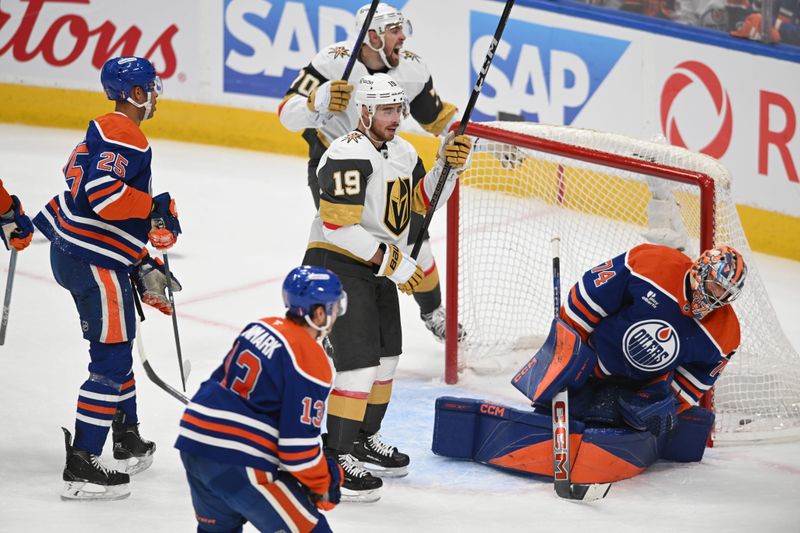 May 10, 2025; Edmonton, Alberta, CAN; Las Vegas Golden Knightsright winger Reilly Smith (19) celebrates a goal on Edmonton Oilers goalie Stuart Skinner (74) during the second period in game three of the second round of the 2025 Stanley Cup Playoffs at Rogers Place. Mandatory Credit: Walter Tychnowicz-Imagn Images