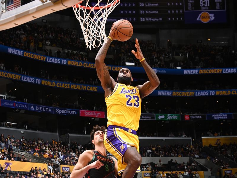 LOS ANGELES, CA - FEBRUARY 29: LeBron James #23 of the Los Angeles Lakers dunks the ball during the game against the Washington Wizards on February 29, 2024 at Crypto.Com Arena in Los Angeles, California. NOTE TO USER: User expressly acknowledges and agrees that, by downloading and/or using this Photograph, user is consenting to the terms and conditions of the Getty Images License Agreement. Mandatory Copyright Notice: Copyright 2024 NBAE (Photo by Andrew D. Bernstein/NBAE via Getty Images)