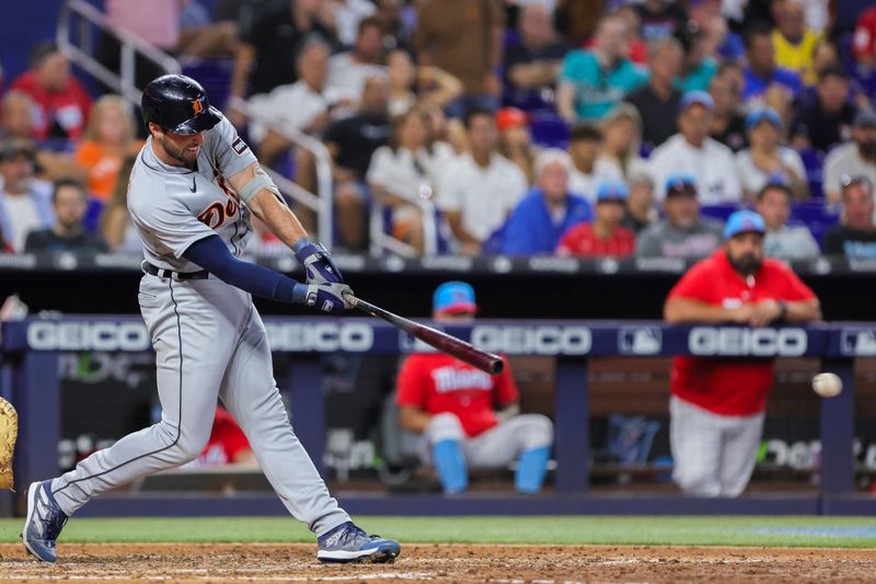 Jul 29, 2023; Miami, Florida, USA; Detroit Tigers right fielder Matt Vierling (8) hits a single against the Miami Marlins during the seventh inning at loanDepot Park. Mandatory Credit: Sam Navarro-USA TODAY Sports