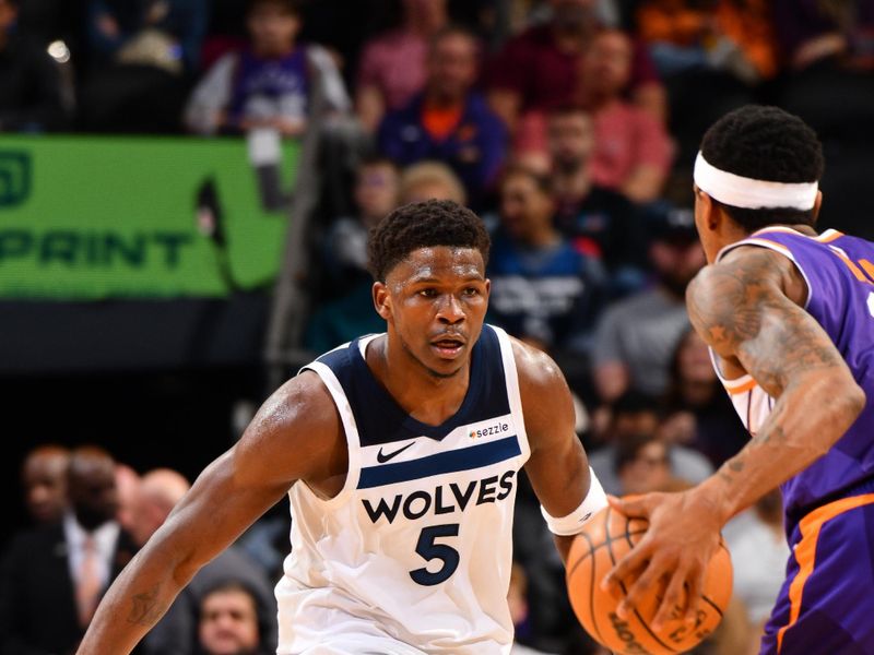 PHOENIX, AZ - JANUARY 29: Anthony Edwards #5 of the Minnesota Timberwolves plays defense during the game against the Phoenix Suns on January 29, 2025 at Footprint Center in Phoenix, Arizona. NOTE TO USER: User expressly acknowledges and agrees that, by downloading and or using this photograph, user is consenting to the terms and conditions of the Getty Images License Agreement. Mandatory Copyright Notice: Copyright 2025 NBAE (Photo by Barry Gossage/NBAE via Getty Images)