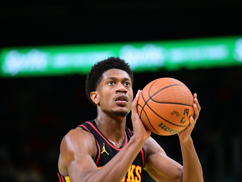 ATLANTA, GA - NOVEMBER 15: De'Andre Hunter #12 of the Atlanta Hawks shoots a free throw during the game against the Washington Wizards  during the Emirates NBA Cup game on November 15, 2024 at State Farm Arena in Atlanta, Georgia.  NOTE TO USER: User expressly acknowledges and agrees that, by downloading and/or using this Photograph, user is consenting to the terms and conditions of the Getty Images License Agreement. Mandatory Copyright Notice: Copyright 2024 NBAE (Photo by Adam Hagy/NBAE via Getty Images)