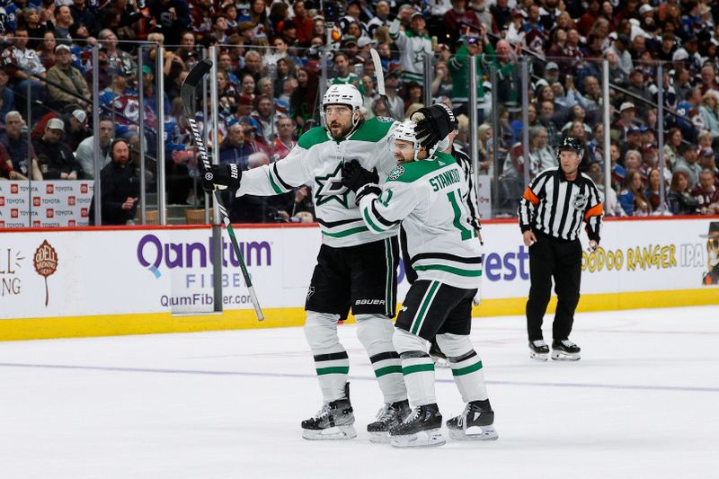 May 11, 2024; Denver, Colorado, USA; Dallas Stars center Logan Stankoven (11) celebrates his goal with defenseman Chris Tanev (3) in the first period against the Colorado Avalanche in game three of the second round of the 2024 Stanley Cup Playoffs at Ball Arena. Mandatory Credit: Isaiah J. Downing-USA TODAY Sports