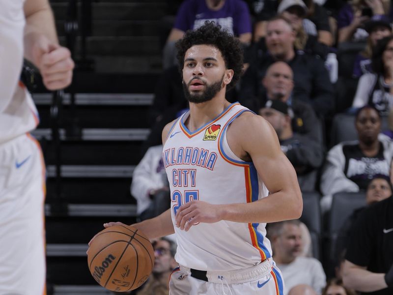 SACRAMENTO, CA - NOVEMBER 25: Ajay Mitchell #25 of the Oklahoma City Thunder dribbles the ball during the game against the Sacramento Kings on November 25, 2024 at Golden 1 Center in Sacramento, California. NOTE TO USER: User expressly acknowledges and agrees that, by downloading and or using this Photograph, user is consenting to the terms and conditions of the Getty Images License Agreement. Mandatory Copyright Notice: Copyright 2024 NBAE (Photo by Rocky Widner/NBAE via Getty Images)