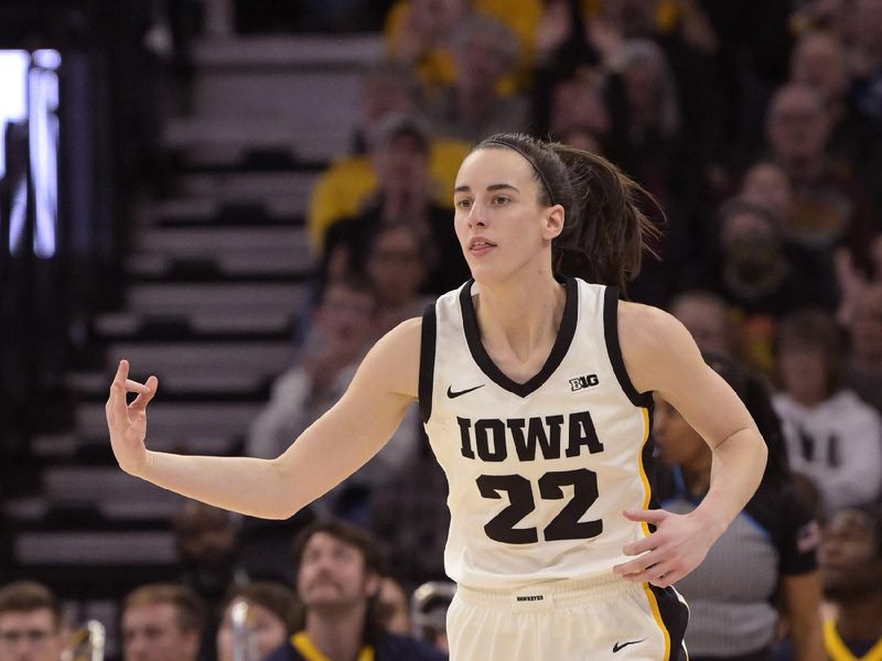 Mar 9, 2024; Minneapolis, MN, USA;  Iowa Hawkeyes guard Caitlin Clark (22) celebrates a three-pointer against the Michigan Wolverines during the first half of a Big Ten Women's Basketball tournament semifinal at Target Center. Mandatory Credit: Nick Wosika-USA TODAY Sports