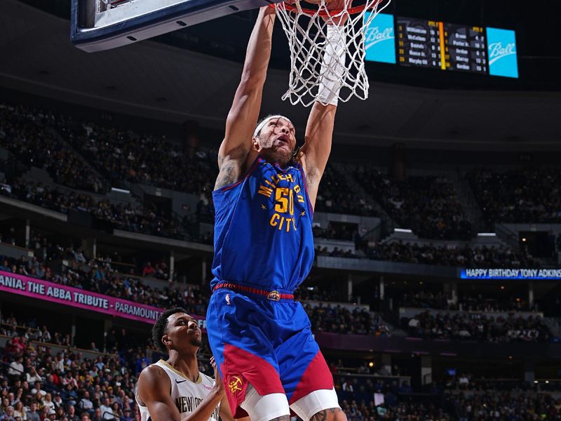 DENVER, CO - JANUARY 12: Aaron Gordon #50 of the Denver Nuggets dunks the ball during the game against the New Orleans Pelicans on January 12, 2024 at the Ball Arena in Denver, Colorado. NOTE TO USER: User expressly acknowledges and agrees that, by downloading and/or using this Photograph, user is consenting to the terms and conditions of the Getty Images License Agreement. Mandatory Copyright Notice: Copyright 2024 NBAE (Photo by Garrett Ellwood/NBAE via Getty Images)