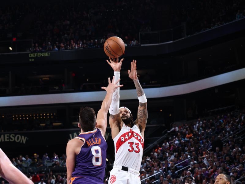 PHOENIX, AZ - MARCH 7: Gary Trent Jr. #33 of the Toronto Raptors shoots the ball during the game against the Phoenix Suns on March 7, 2024 at Footprint Center in Phoenix, Arizona. NOTE TO USER: User expressly acknowledges and agrees that, by downloading and or using this photograph, user is consenting to the terms and conditions of the Getty Images License Agreement. Mandatory Copyright Notice: Copyright 2024 NBAE (Photo by Jeff Haynes/NBAE via Getty Images)