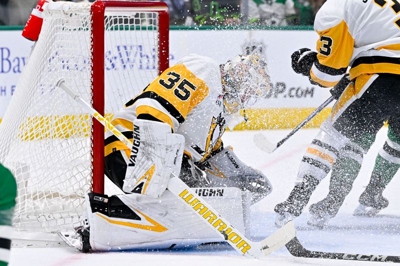 Mar 22, 2024; Dallas, Texas, USA; Pittsburgh Penguins goaltender Tristan Jarry (35) allows a second goal to Dallas Stars left wing Jamie Benn (not pictured) during the second period at the American Airlines Center. Mandatory Credit: Jerome Miron-USA TODAY Sports