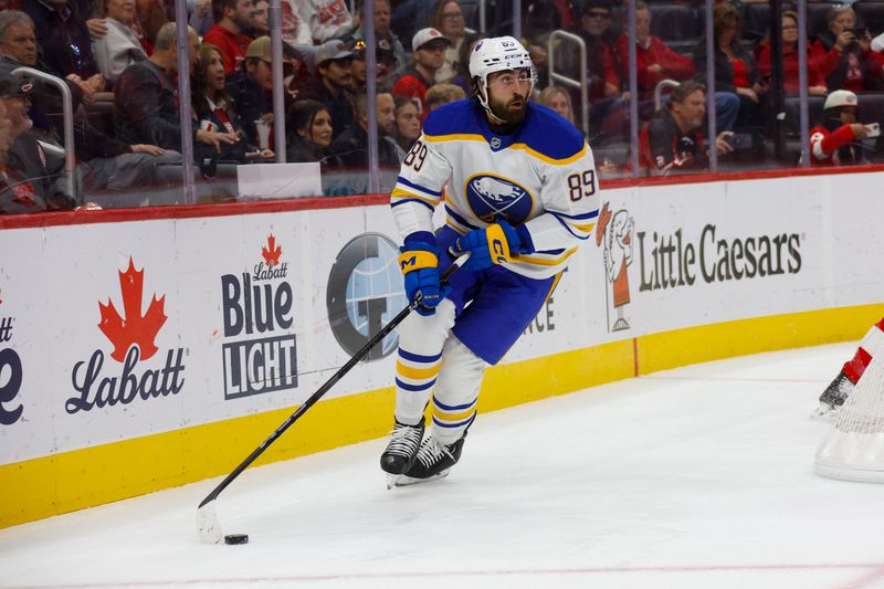 Nov 2, 2024; Detroit, Michigan, USA; Buffalo Sabres right wing Alex Tuch (89) handles the puck during the first period of the game against the Detroit Red Wings at Little Caesars Arena. Mandatory Credit: Brian Bradshaw Sevald-Imagn Images