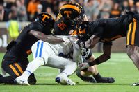 Kentucky Wildcats' Efforts Fall Short Against Tennessee Volunteers at Neyland Stadium