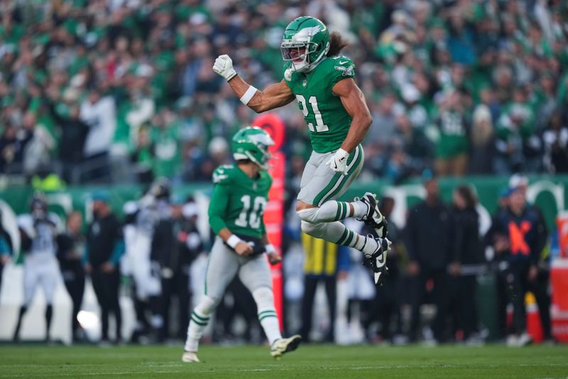 Philadelphia Eagles safety Sydney Brown reacts after Philadelphia Eagles cornerback Kelee Ringo recovers a fumble by Jacksonville Jaguars wide receiver Austin Trammell during the first half of an NFL football game against the Jacksonville Jaguars on Sunday, Nov. 3, 2024, in Philadelphia. (AP Photo/Matt Slocum)